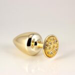Plug M Dourado Cravejado Em Strass Hard